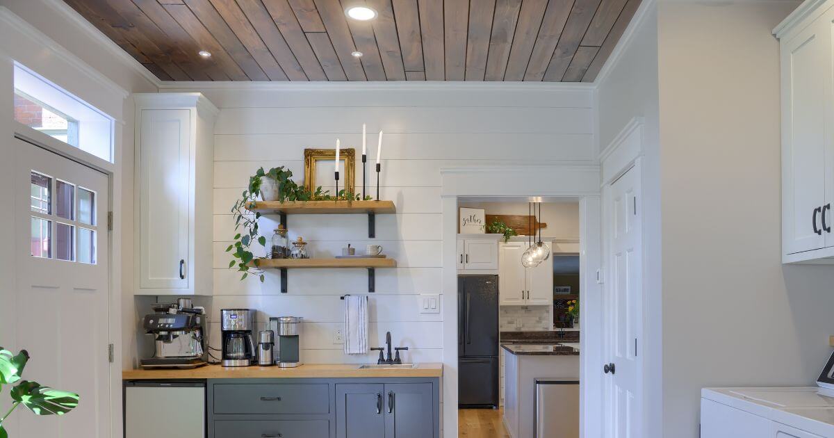 dark wood kitchen ceiling design with white and blue cabinets