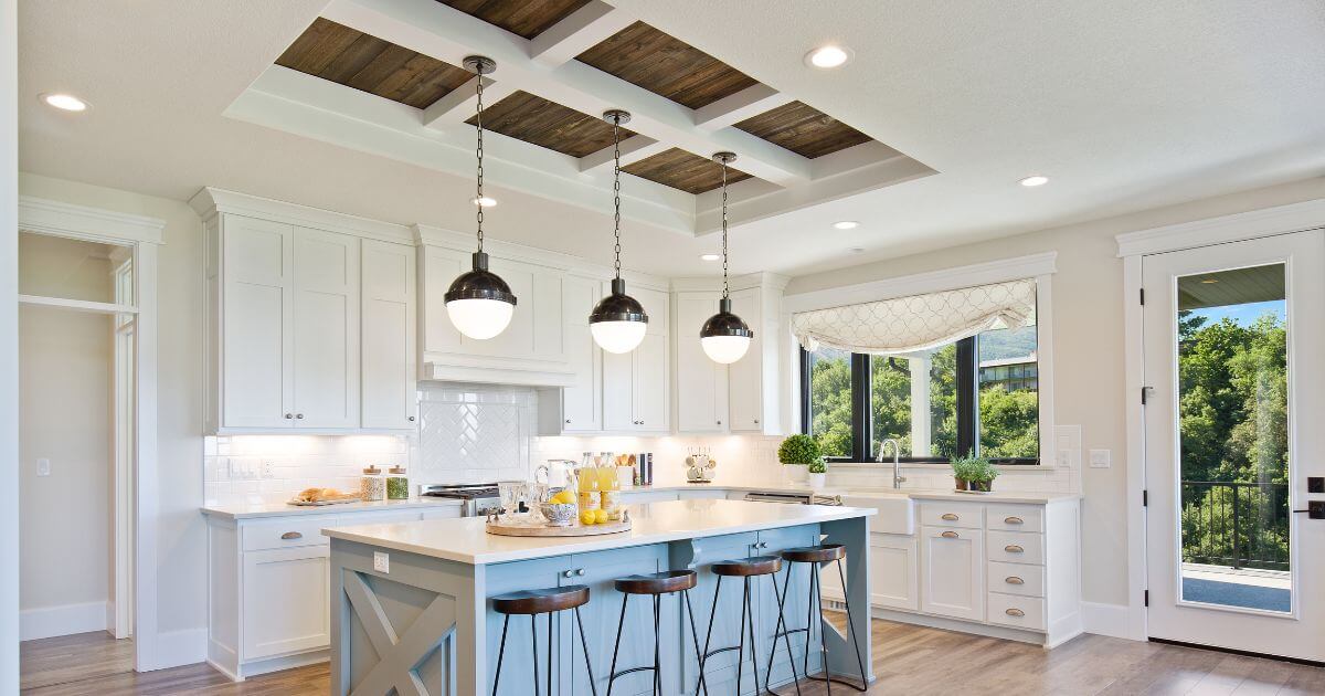 wood coffered kitchen ceiling design with white beams in white kitchen with blue island