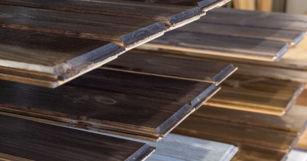 prefinished tongue and groove planks stacked on a shelf