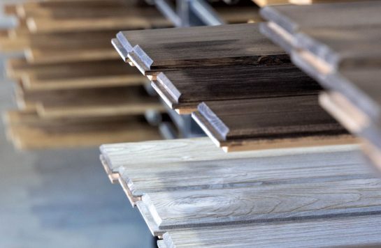 wood panel collection stack in prestige warehouse