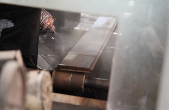 staining machine in wood panel warehouse