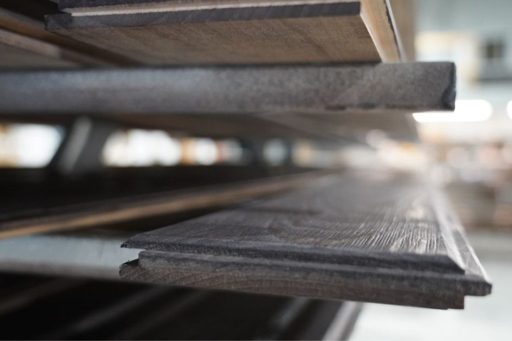 drying rack of freshly stained wood panels