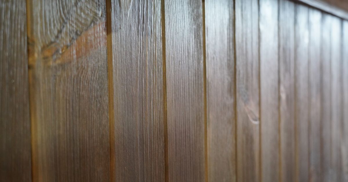 poly coated finished wood panels on a wall