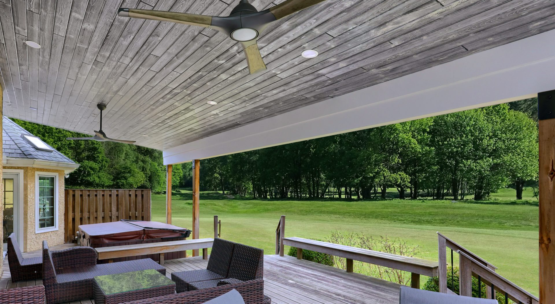 Outdoor patio with pine plank ceiling