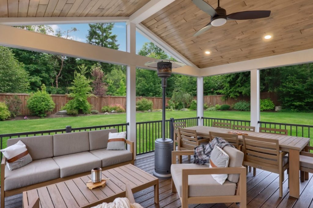 outdoor sitting area with wood panel ceiling