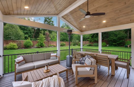 covered patio with prefinished wood paneling ceiling and outdoor seating area