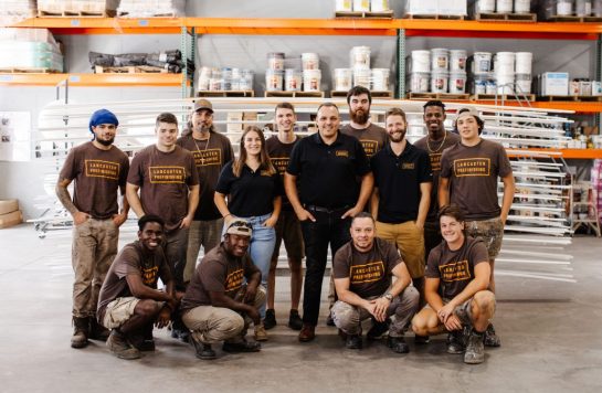 prestige wood products' team in warehouse