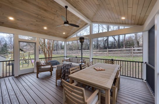 screened patio ceiling finished with prefinished wood paneling and outdoor furniture