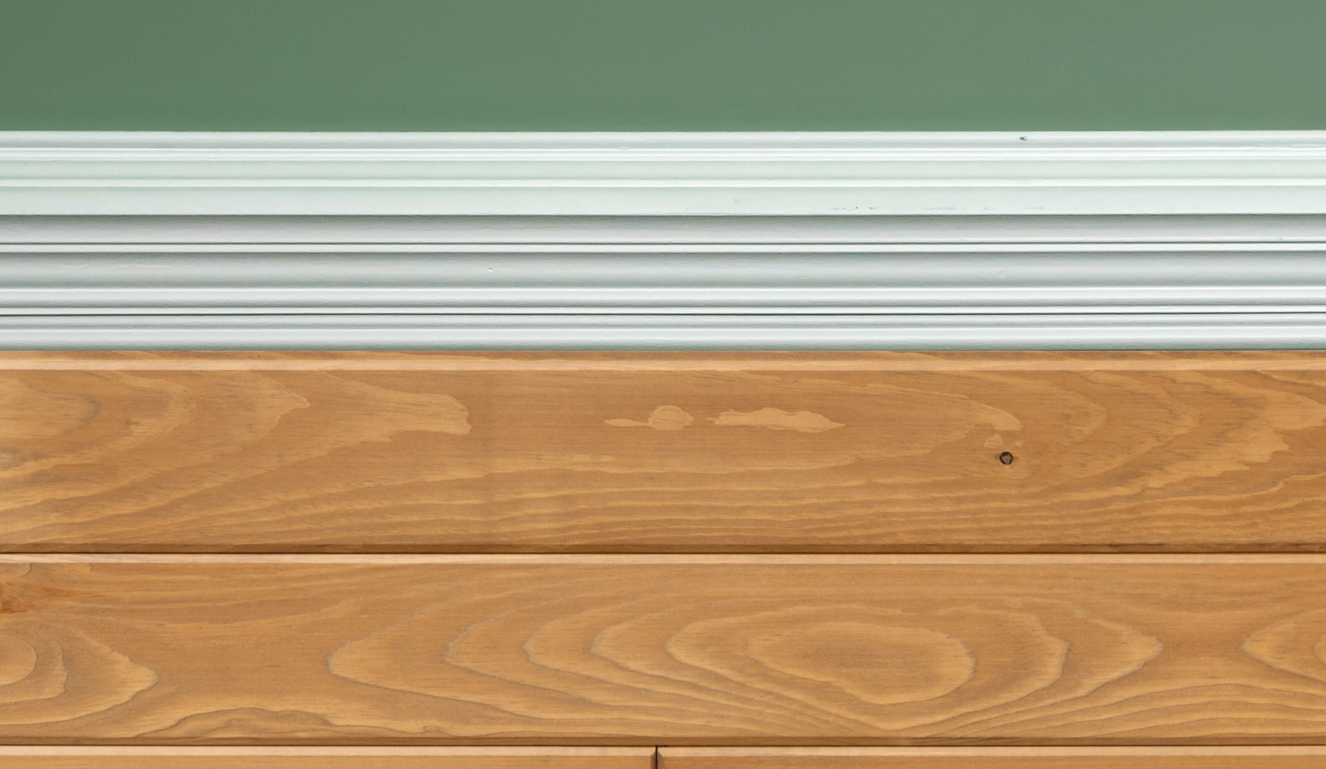 Trending Wood half Wall Bathroom with rich planks, molding, and a bold paint color